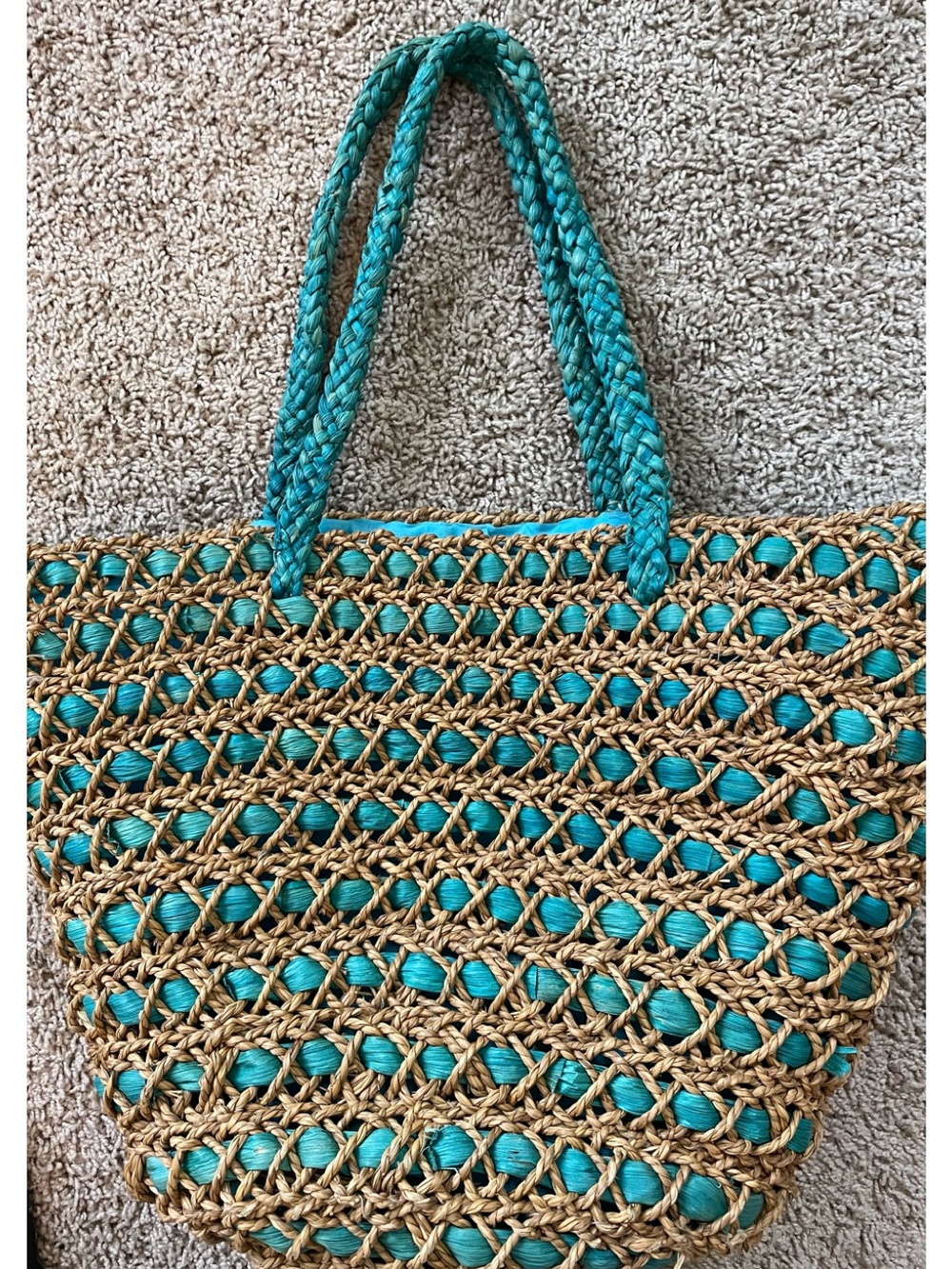 Woven Straw Bag with fabric liner Bag is in good used condition